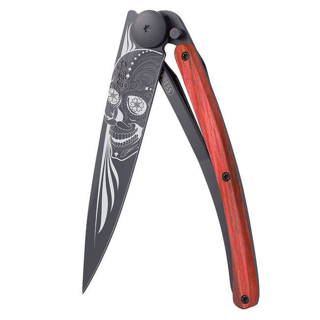 Deejo Latino teschio chiusura coltello nero tatuaggio biker rosso faggio