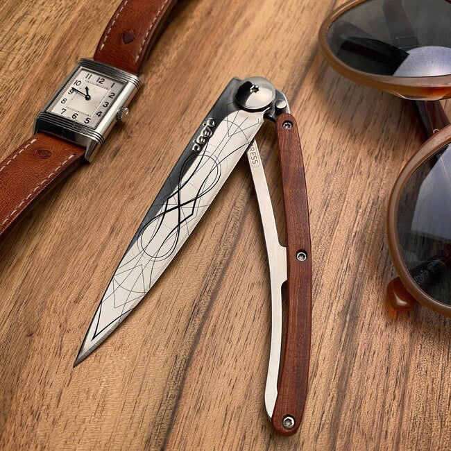 Deejo Coralwood Infinity coltello di chiusura a specchio per tatuaggi