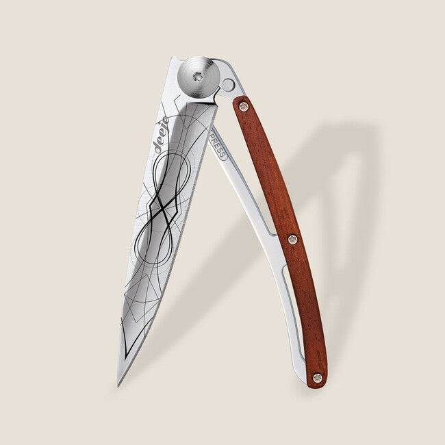 Deejo Coralwood Infinity coltello di chiusura a specchio per tatuaggi