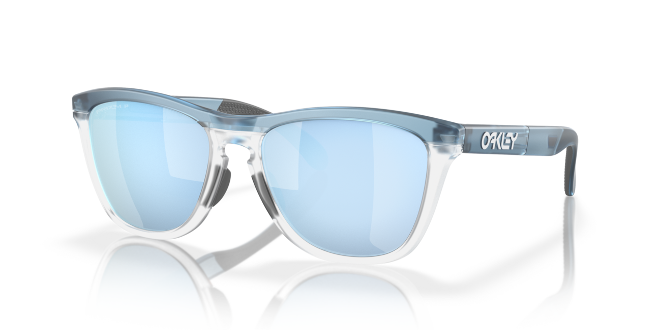Oakley Frogskins Range occhiali da sole con telaio Trans Stonewash/Clear e con le diapositive Prizm Deep Water Polarized 55